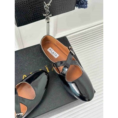 Alaia Criss Cross Ballet Flats in Black Leather