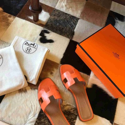Hermes Oran Slide Sandals In Orange Swift Calfskin