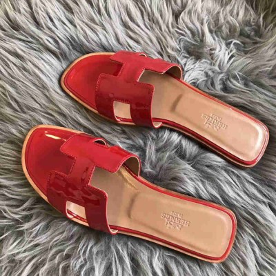 Hermes Oran Slide Sandals In Red Patent Calfskin