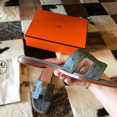 Hermes Oran Slide Sandals In Vert Amande Ostrich Leather