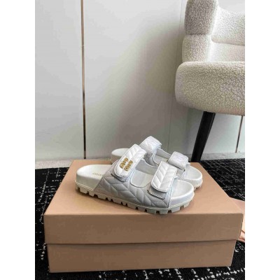Miu Miu Slide Sandals in White Matelasse Nappa Leather
