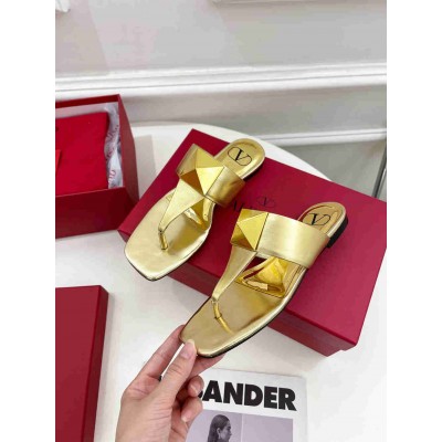 Valentino One Stud Flat Thong Sandals In Gold Metallic Leather